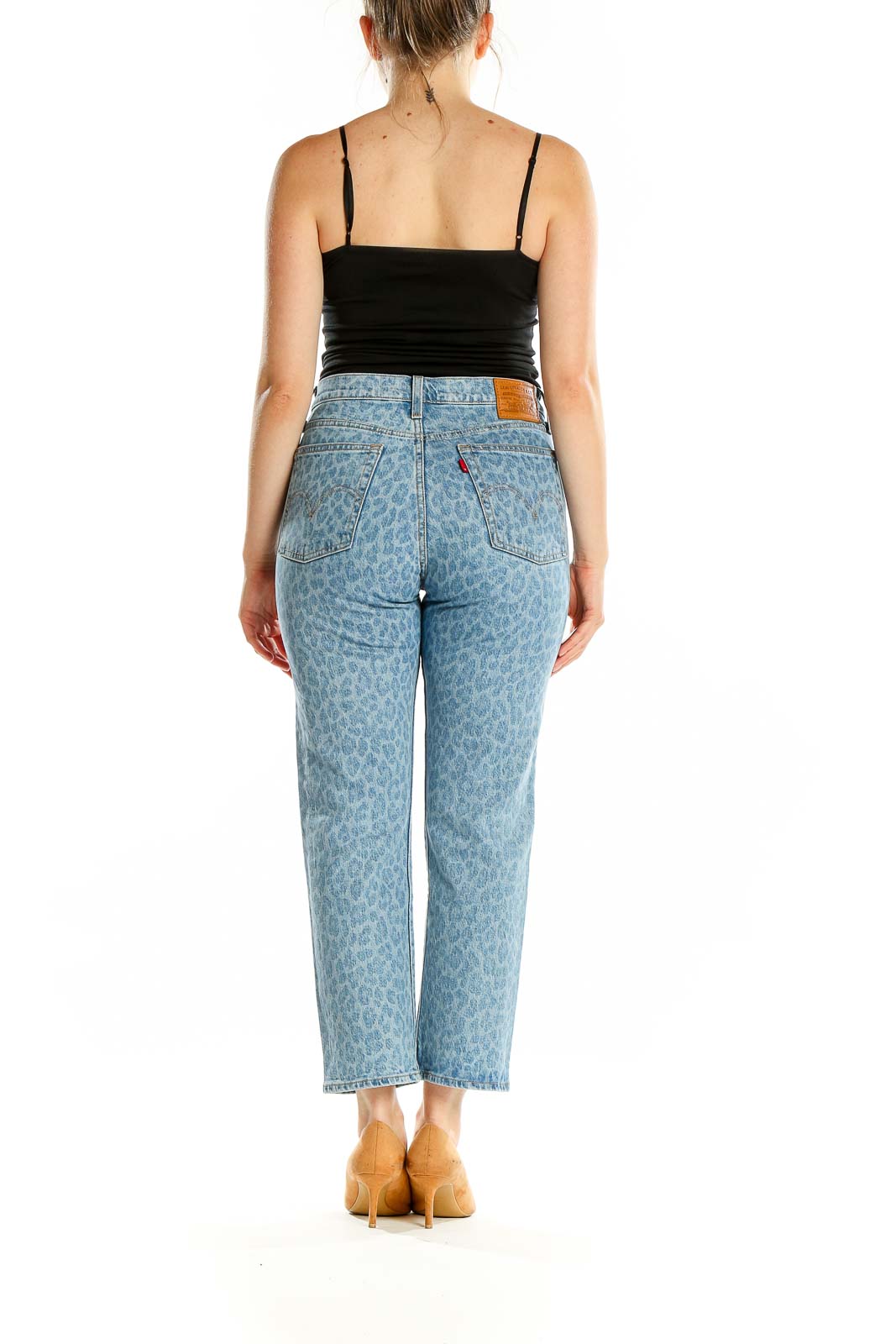 Back view of Levi's Light Blue Leopard Print Straight Leg Jeans on model