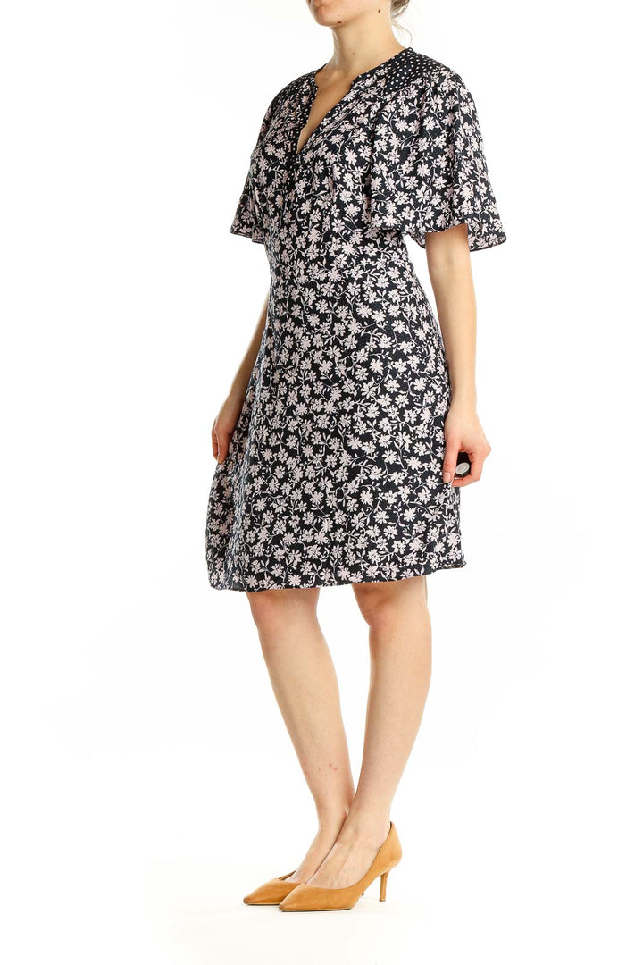 Front view of Rebecca Taylor black floral print dress with flutter sleeves