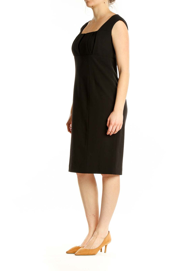 Front view of black Calvin Klein sheath dress with square neckline and cap sleeves