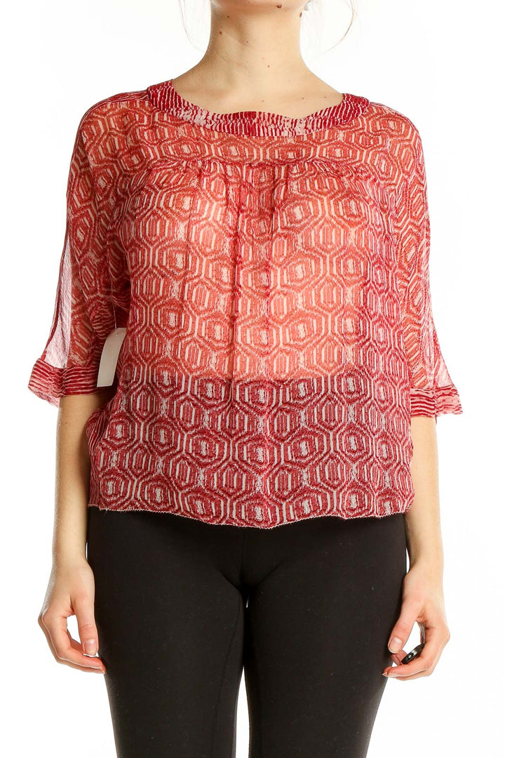 Front view of Isabel Marant Etoile red silk blouse with geometric print