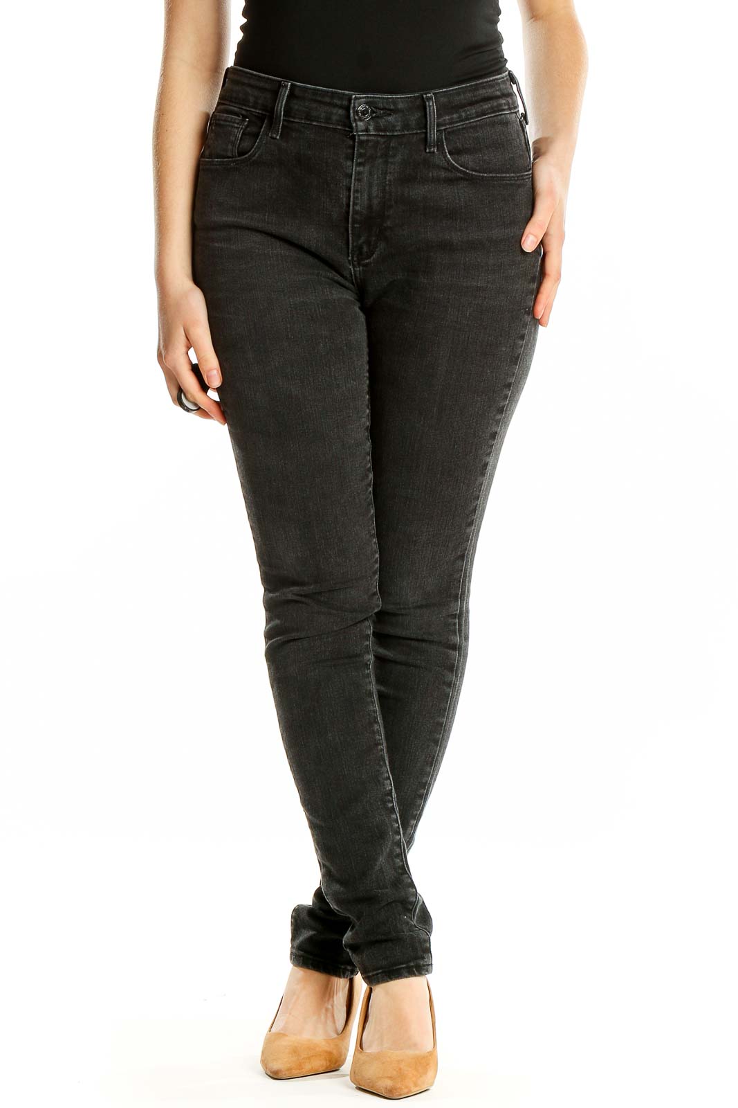 Front view of Levi's black slim fit jeans on model