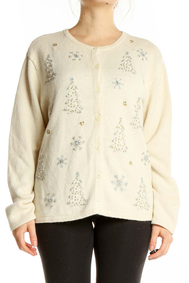 Front view of Croft & Barrow cream cardigan with silver Christmas tree and snowflake embellishments