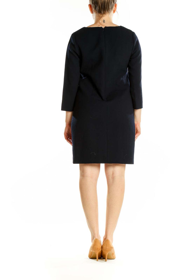 Back view of J.Crew black shift dress with three-quarter sleeves