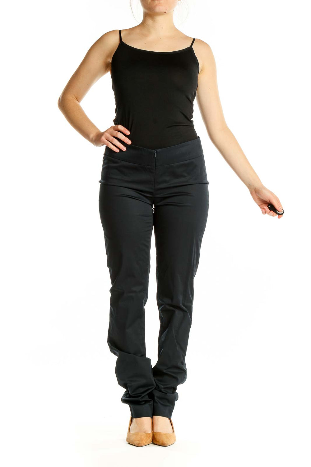 Front view of black slim-fit Worth pants on model