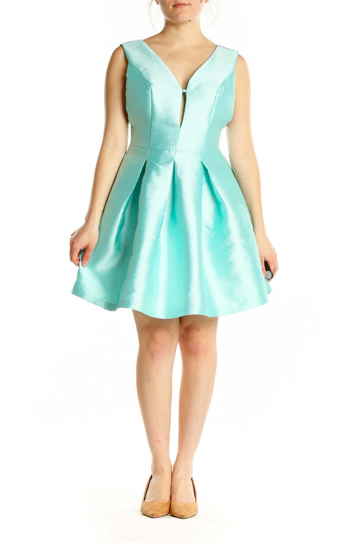 Front view of Lucy Wang mint green pleated cocktail dress with V-neckline