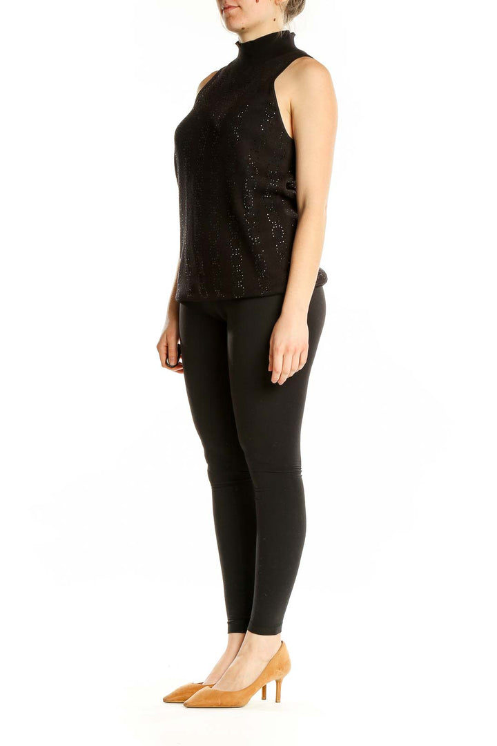 Front view of Black Sparkly Sleeveless Turtleneck Top from White House Black Market