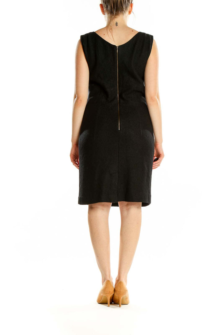 Back view of Banana Republic black sleeveless sheath dress with zipper closure