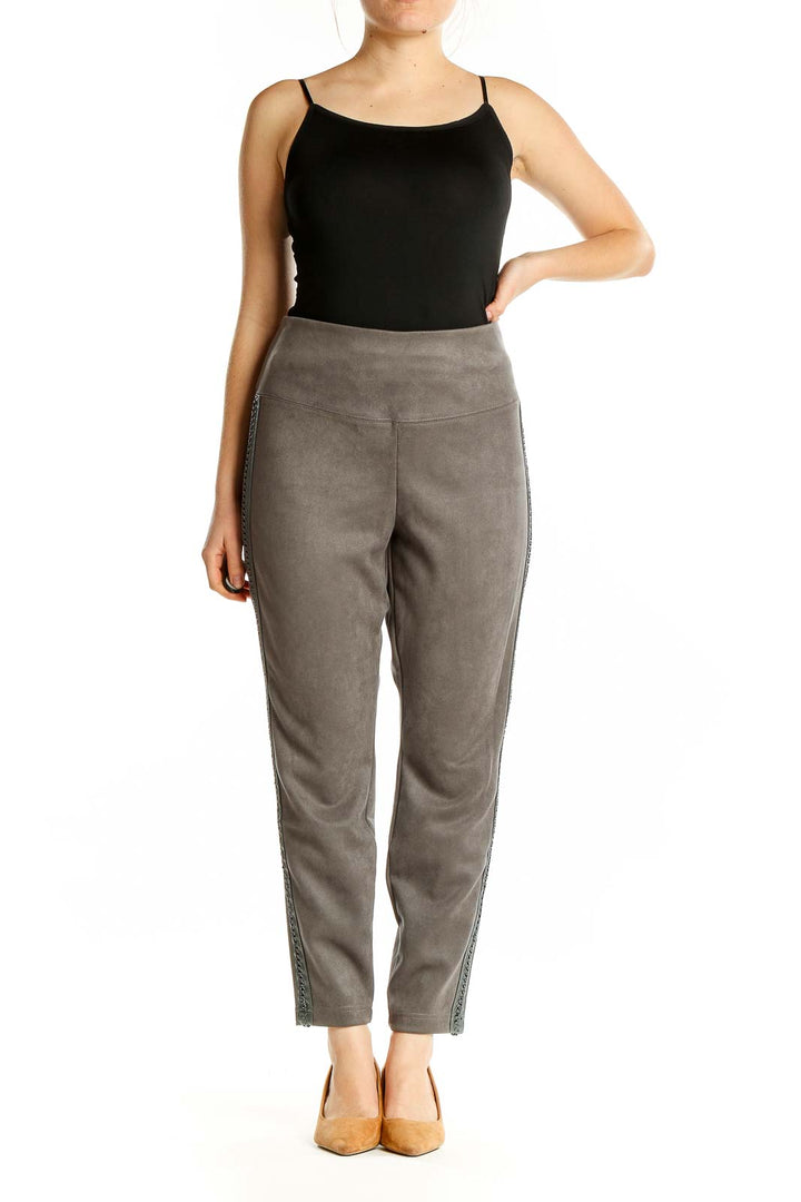 Front view of gray suede-like ankle pants with embellished sides from White House Black Market