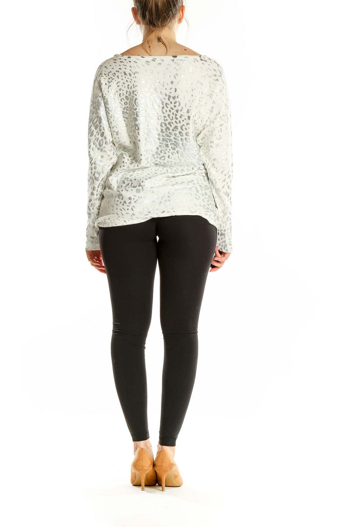 Back view of Boston Proper white leopard print long sleeve top showing relaxed fit