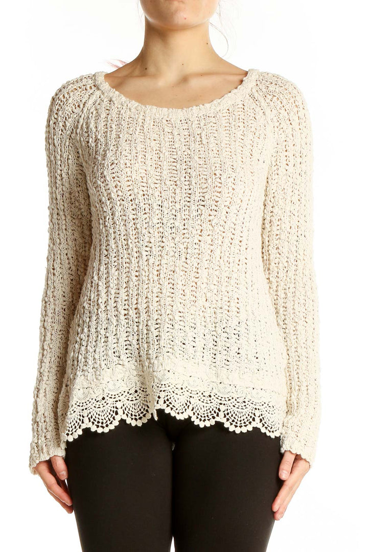 Front view of cream knitted cotton sweater with lace trim by KNITTED & KNOTTED