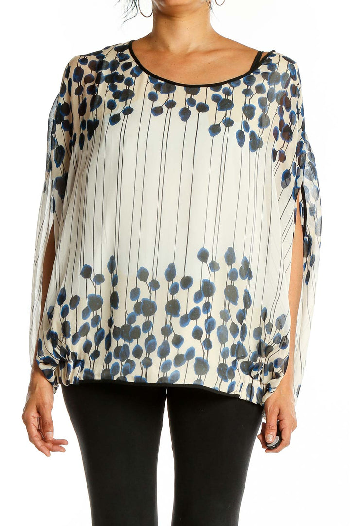 Front view of white sheer blouse with navy floral print by Diane von Furstenberg