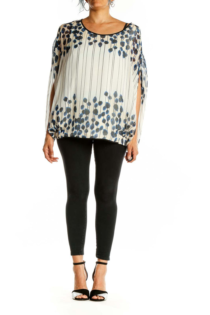 Front view of white sheer blouse with navy floral print by Diane von Furstenberg