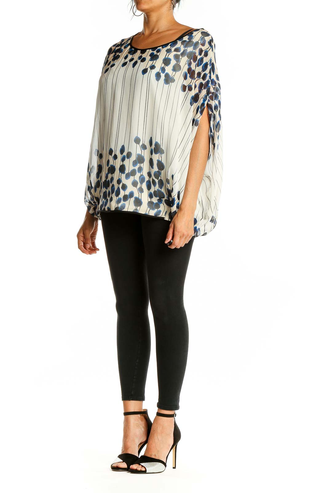 Front view of white sheer blouse with navy floral print by Diane von Furstenberg