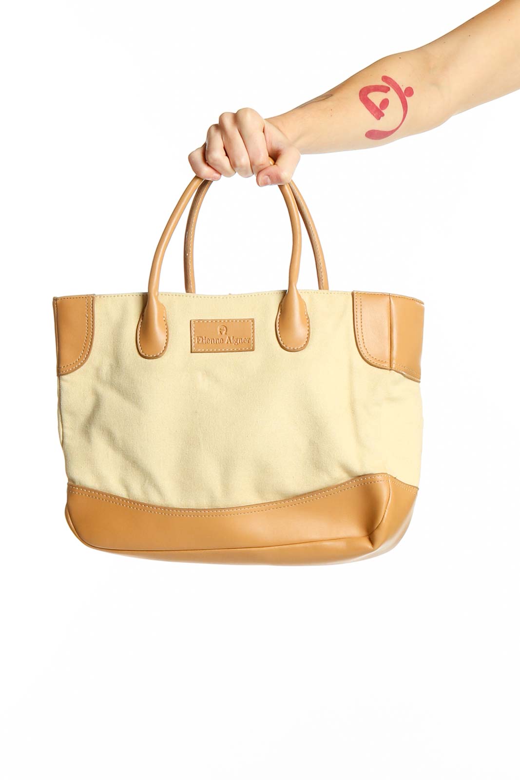 Front view of Etienne Aigner beige canvas tote bag with leather trim