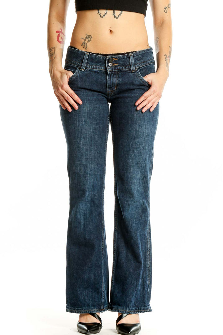 Front view of dark blue flared jeans from Hudson Jeans on a woman