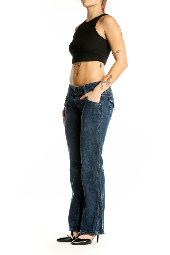 Front view of dark blue flared jeans from Hudson Jeans on a woman