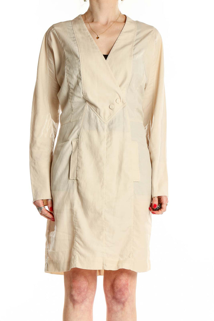 Front view of beige BCBG MaxAzria wrap dress with V-neckline and long sleeves