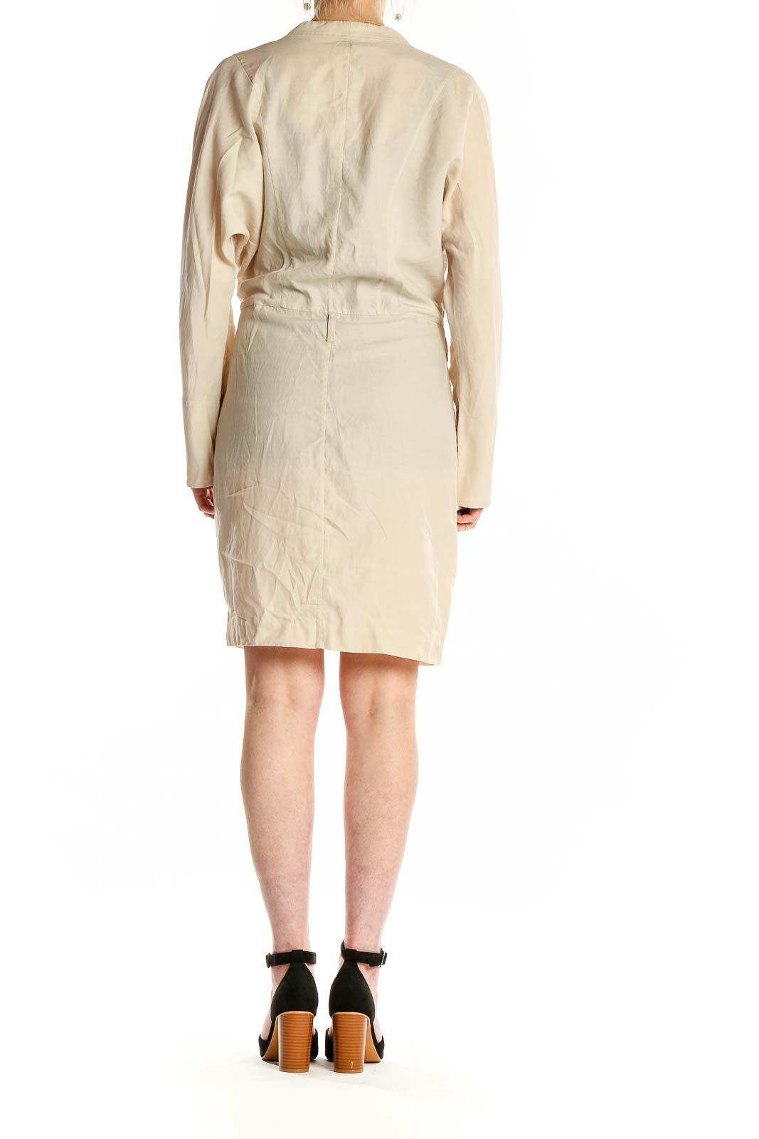 Back view of beige BCBG MaxAzria wrap dress showing clean lines and knee-length cut