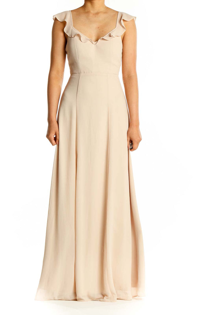 Front view of beige BHLDN Anthropologie maxi dress with ruffled cap sleeves and sweetheart neckline