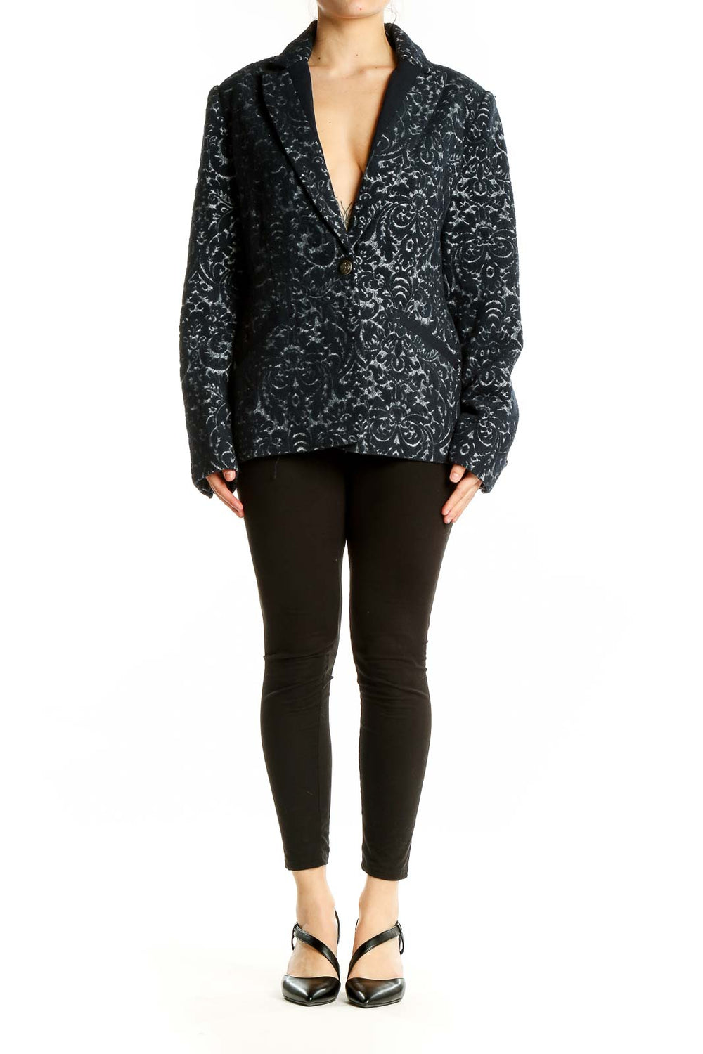 Front view of Cabi black floral jacquard blazer with single button closure