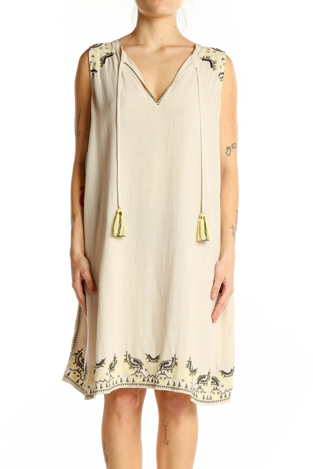 Front view of beige LOFT Outlet LOUNGE sleeveless shift dress with black embroidery