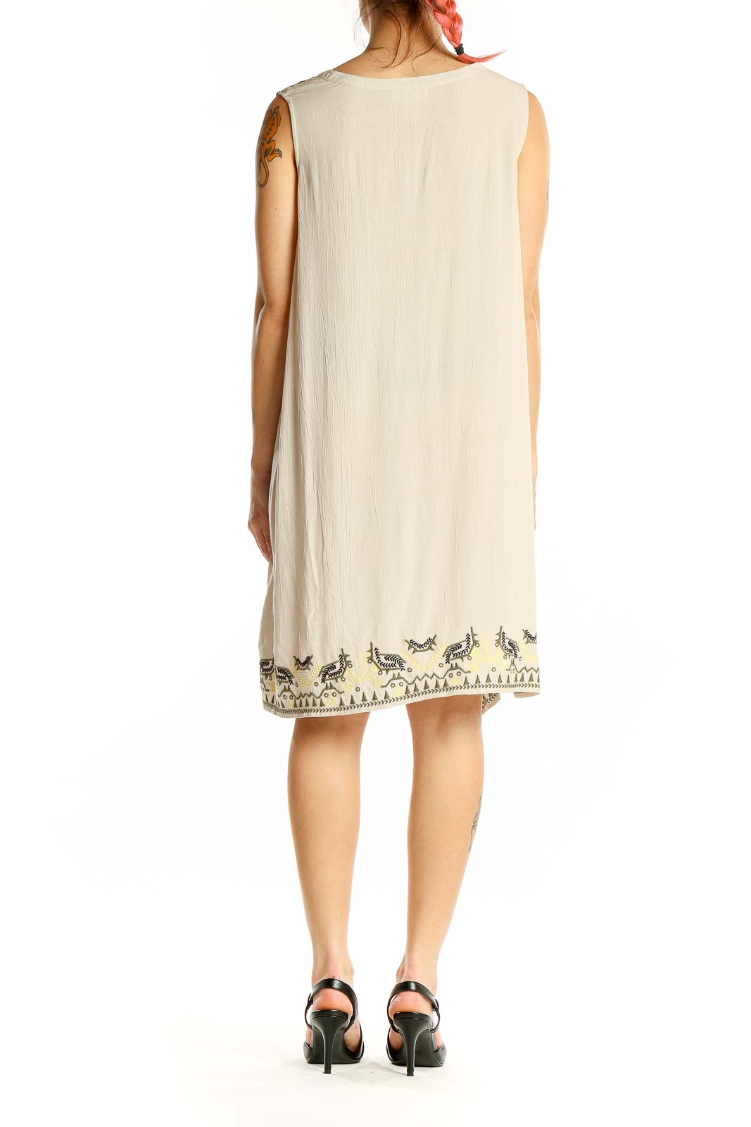 Back view of beige LOFT Outlet LOUNGE sleeveless shift dress showing embroidered hem