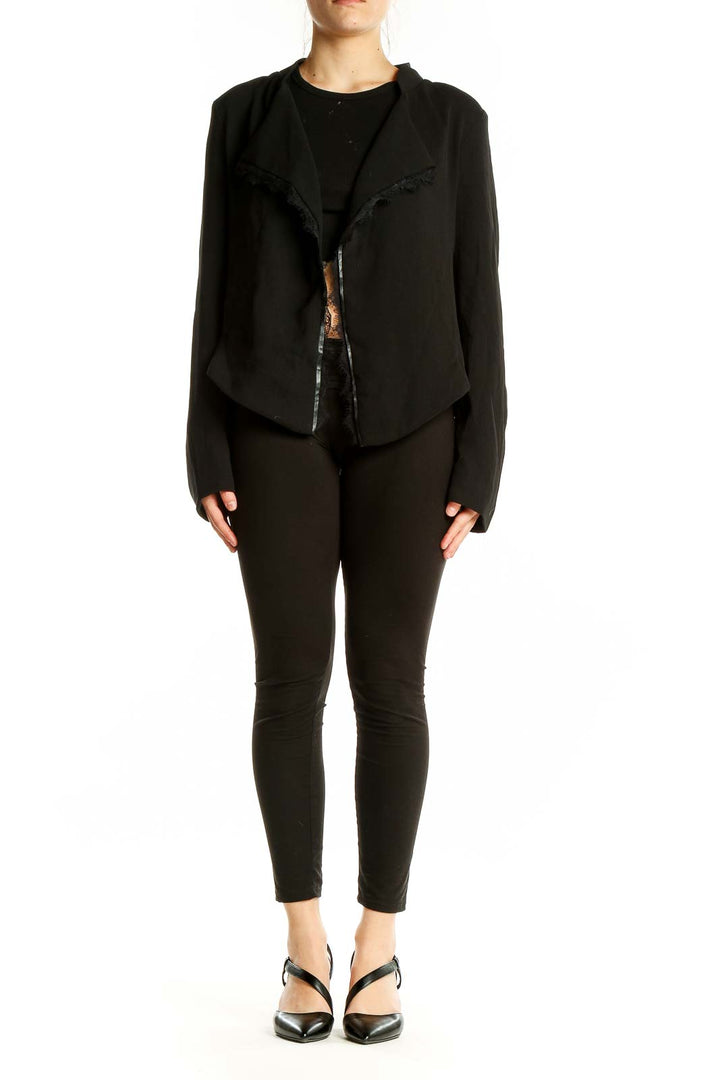 Front view of Elevenses black open-front jacket with cascading lapel