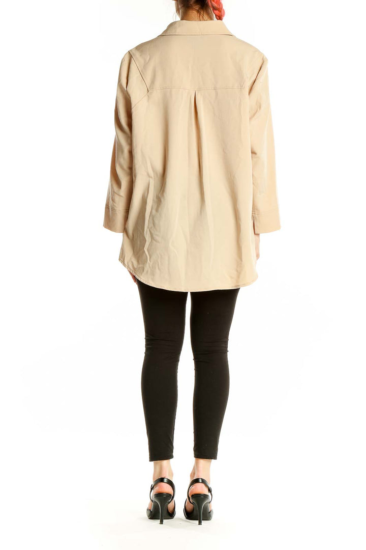 Back view of Peace of Cloth beige oversized button-down blouse