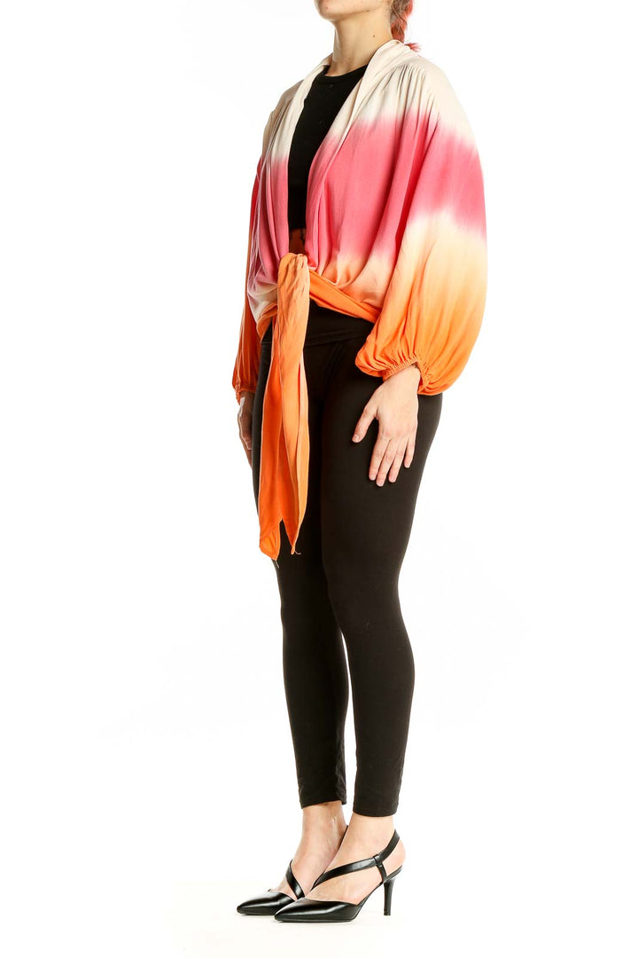 Front view of Young Fabulous & Broke ombre rayon tie-front top in cream, coral, and orange