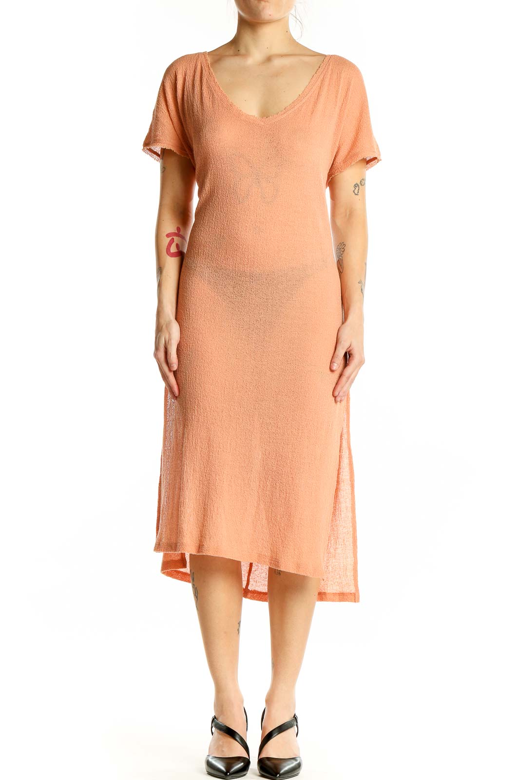 Front view of peach knit midi dress with V-neck and short sleeves