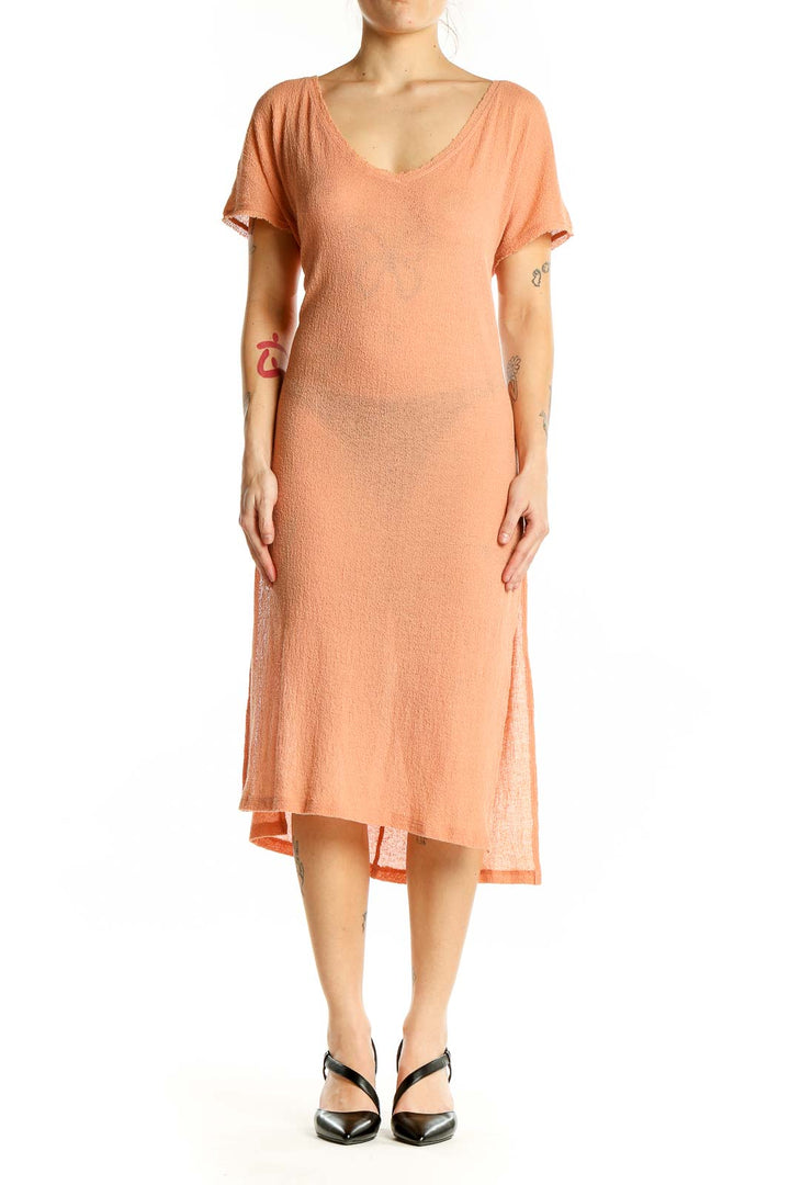 Front view of peach knit midi dress with V-neck and short sleeves