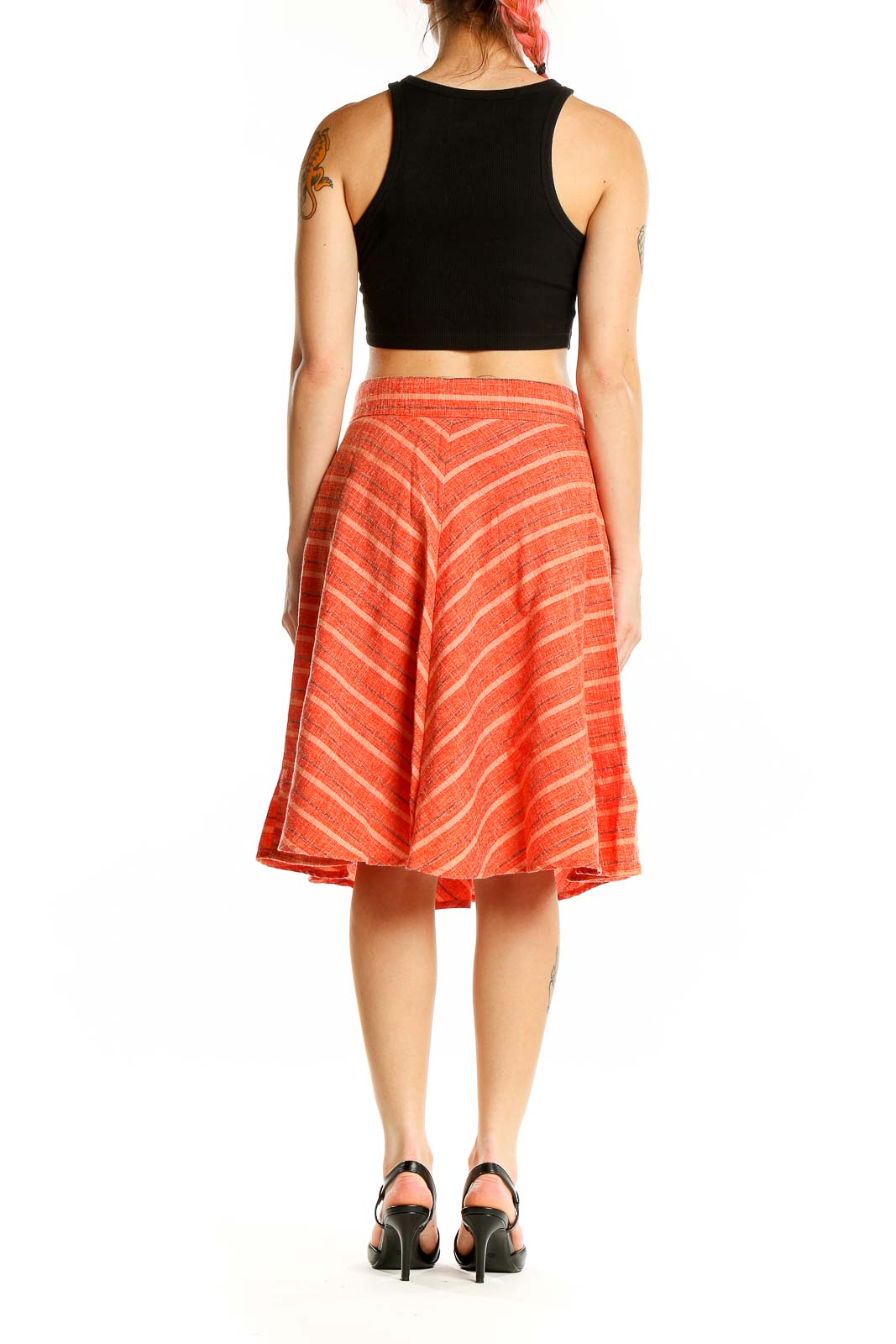 Back view of Harlyn orange striped A-line midi skirt showing full silhouette