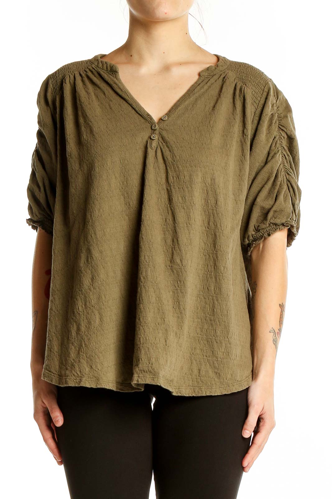 Front view of olive Free People peasant blouse with gathered neckline and billowy sleeves