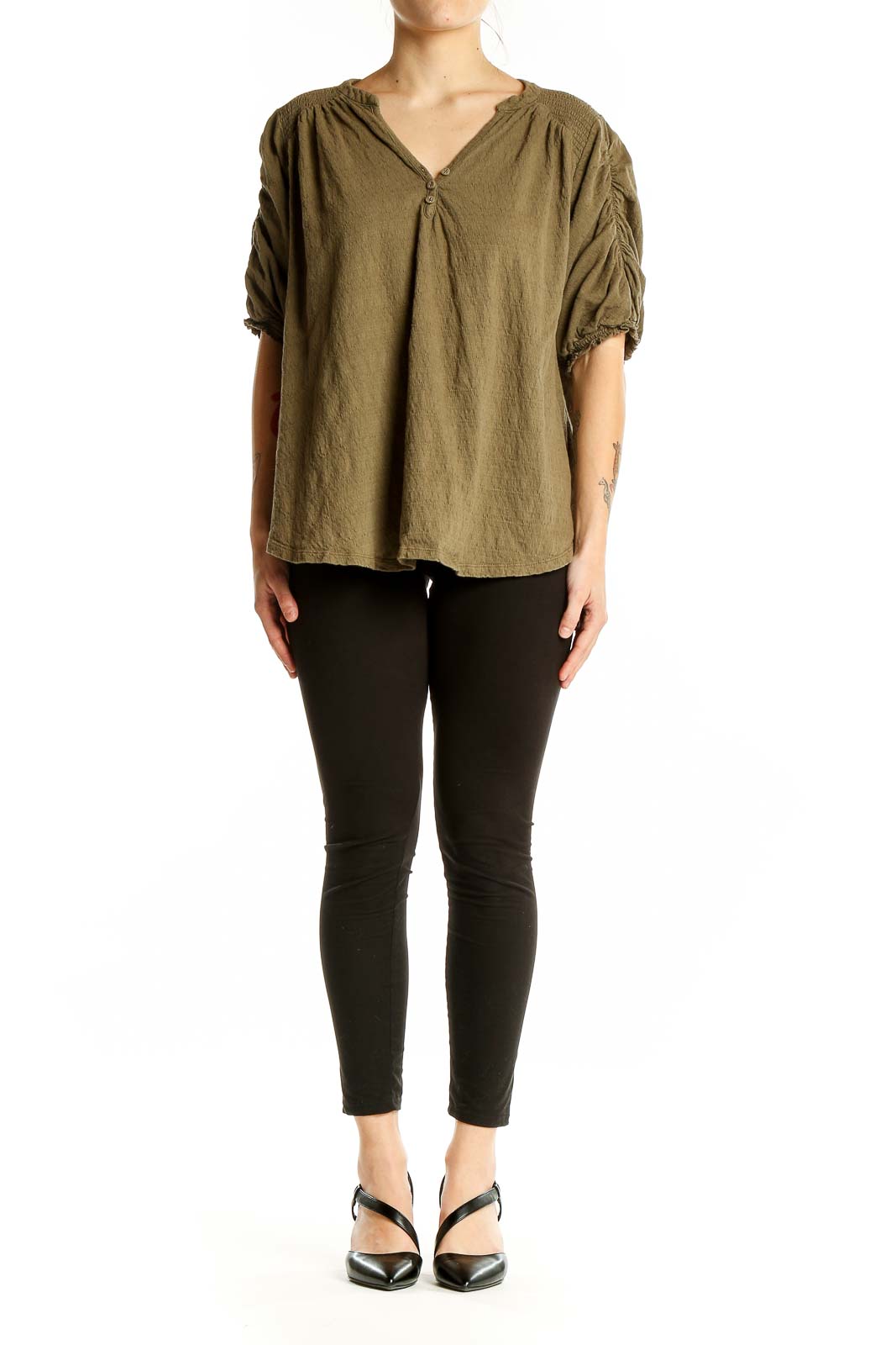 Front view of olive Free People peasant blouse with gathered neckline and billowy sleeves