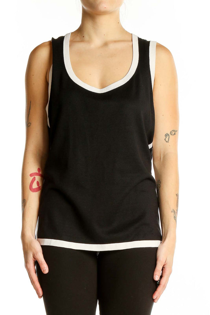 Front view of Ann Taylor black tank top with white trim