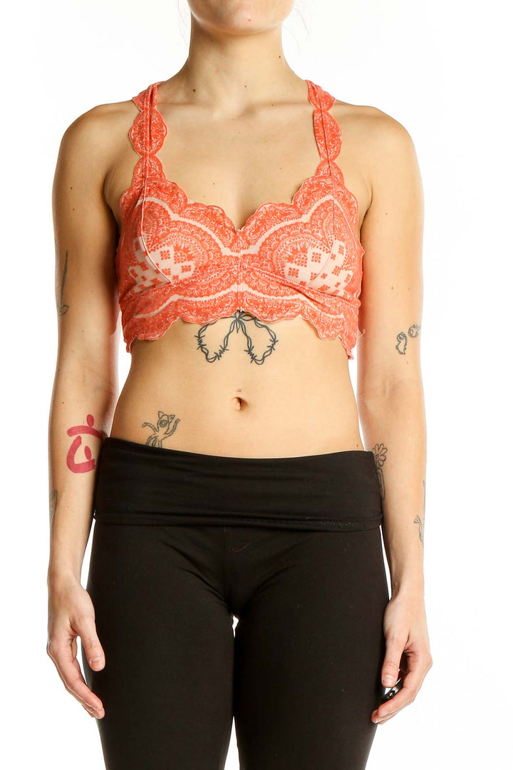 Front view of coral lace racerback bralette by Intimately Free People