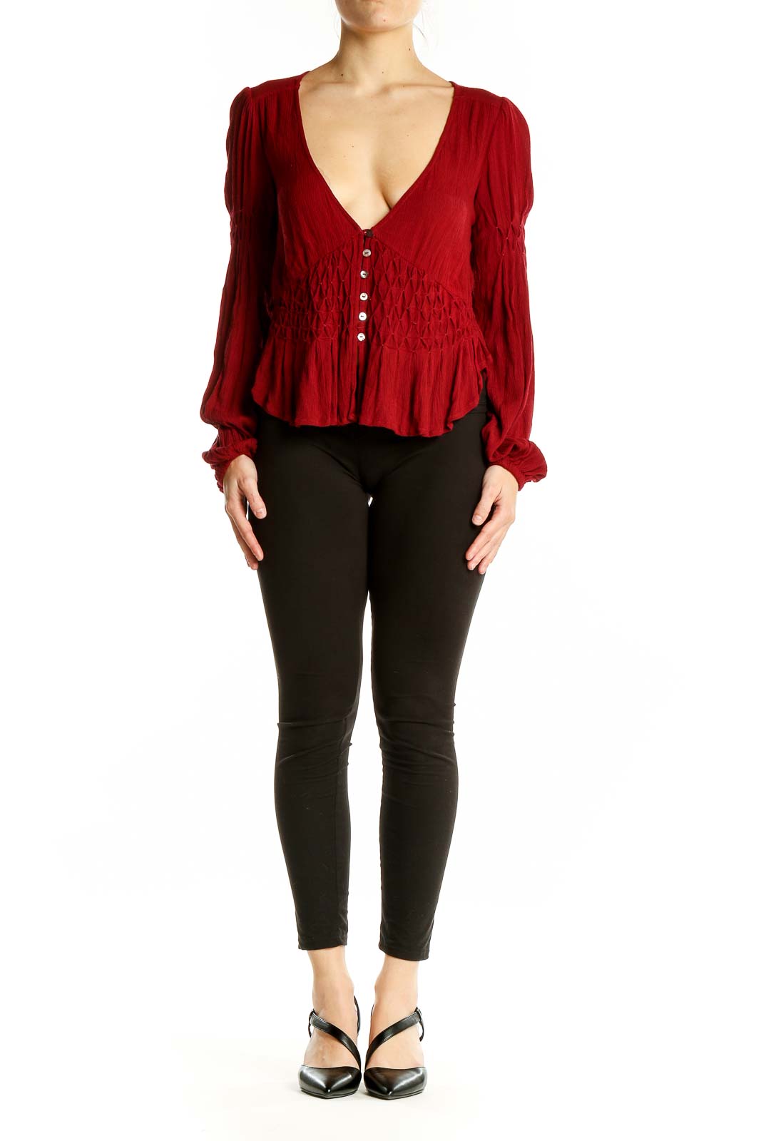 Front view of red rayon smocked peplum top from Free People