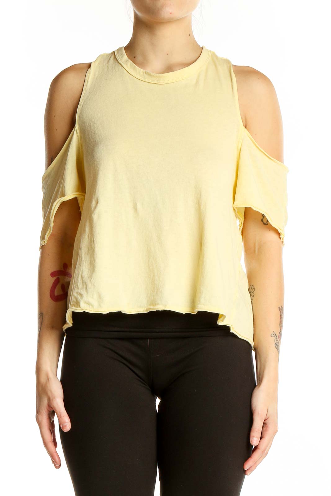 Front view of yellow cold shoulder cotton top by WE THE FREE