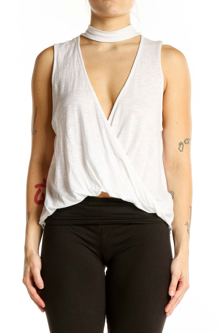 Front view of white choker neck wrap tank top by Silence + Noise