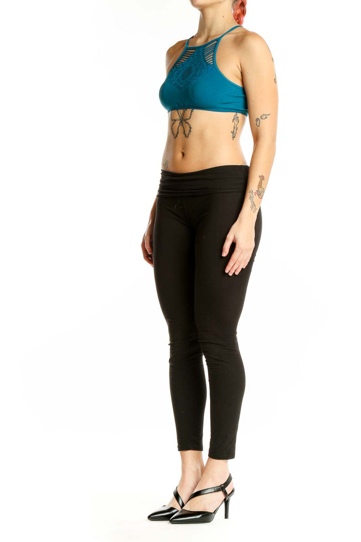 Front view of teal cutout halter crop top by Intimately Free People