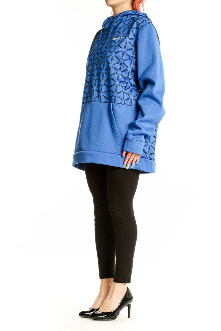 Front view of blue Nike activewear hoodie with geometric pattern