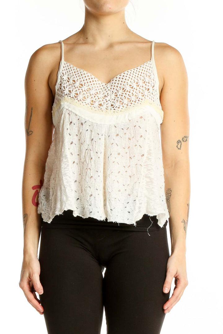 Front view of white lace crochet crop tank top from Free People