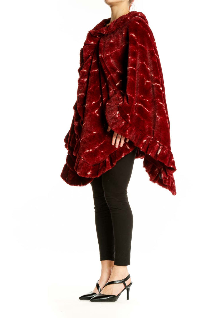 Front view of Adrienne Landau red faux fur ruffled cape coat with marbled pattern