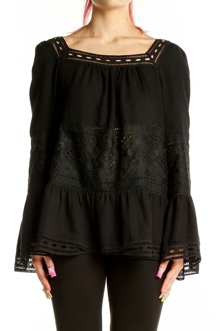 Front view of Max Studio black lace-trimmed blouse with bell sleeves