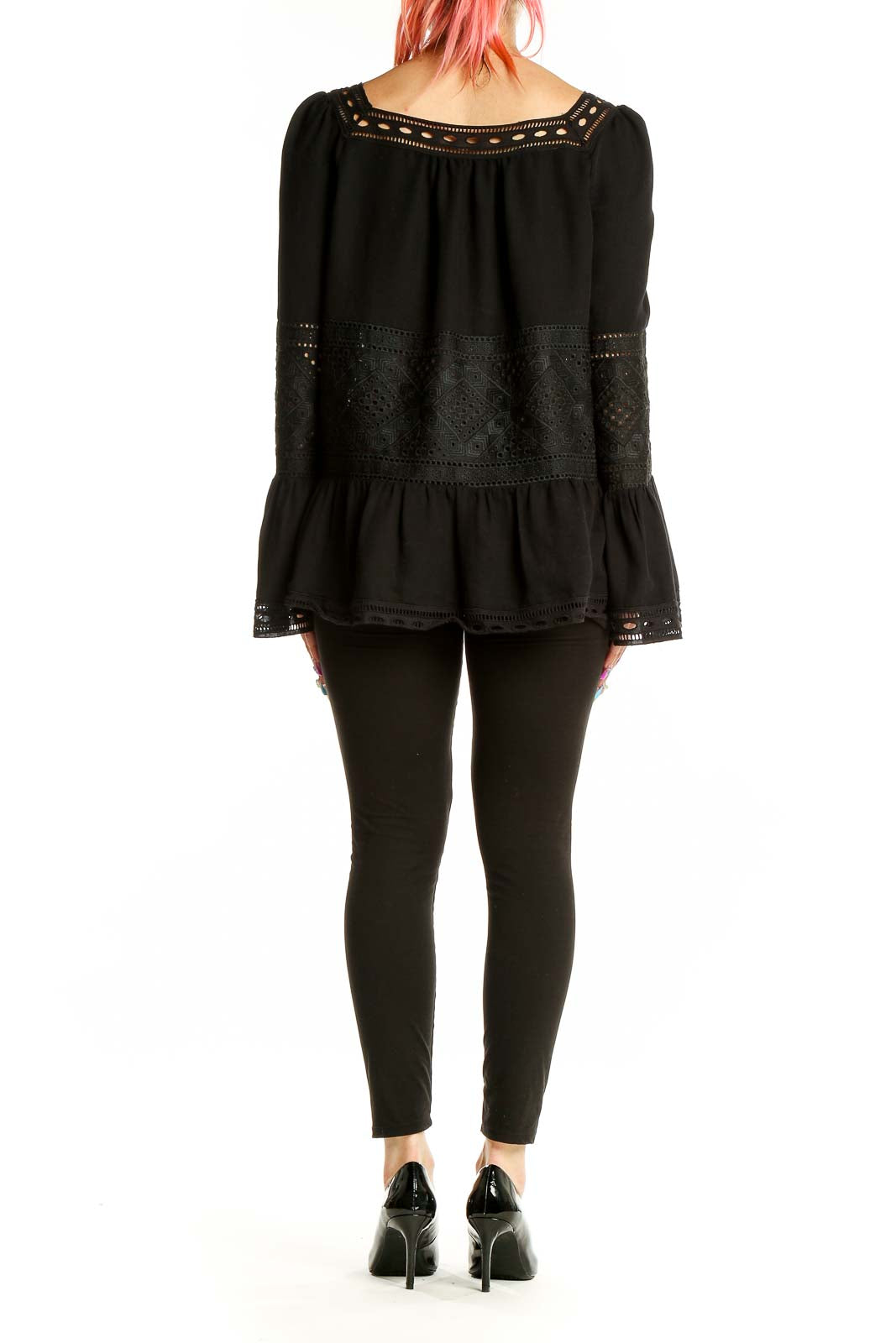 Back view of Max Studio black lace-trimmed blouse showing bell sleeves and flowing silhouette