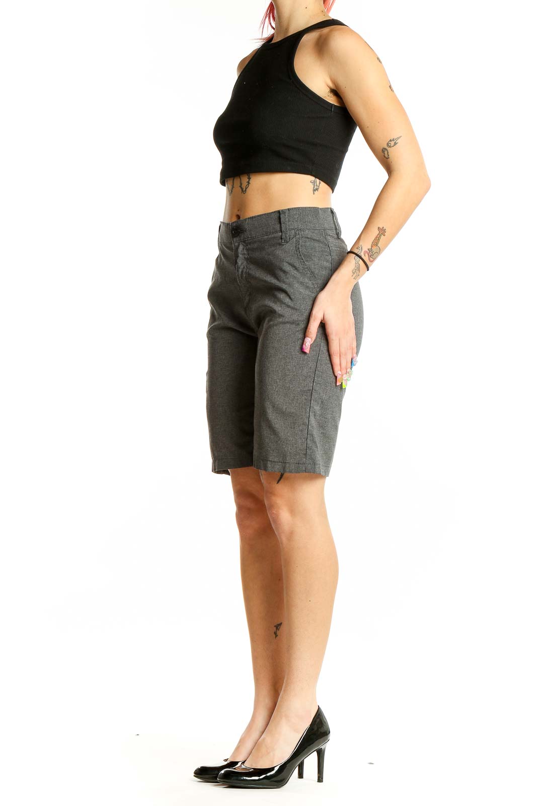 Front view of gray Levi's Bermuda shorts on model