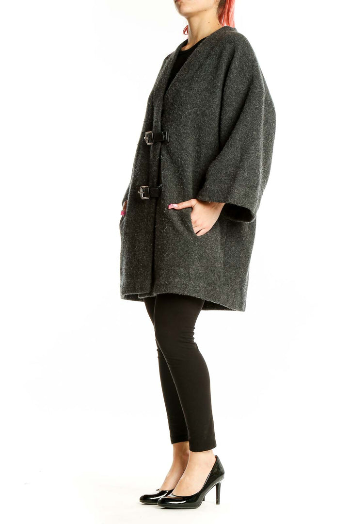 Front view of MICHAEL Michael Kors charcoal oversized wool coat with leather buckle closures