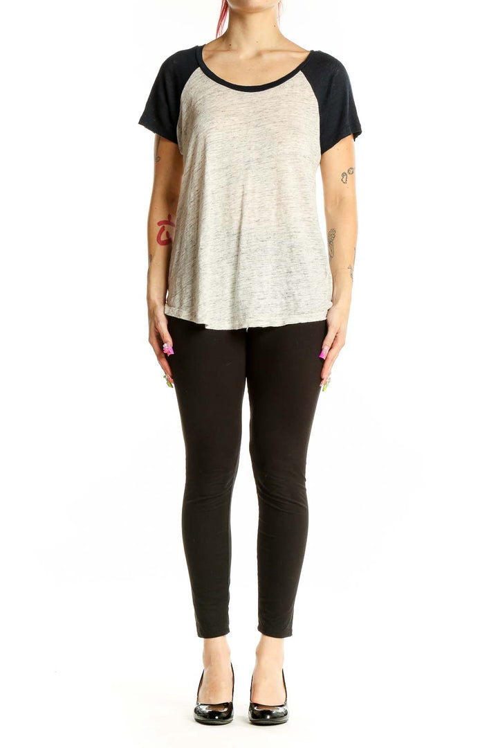 Front view of J.Crew gray linen top with black raglan sleeves