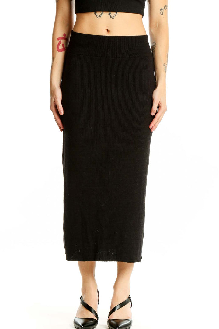 Front view of Free People Black Ribbed Cotton Midi Skirt on model