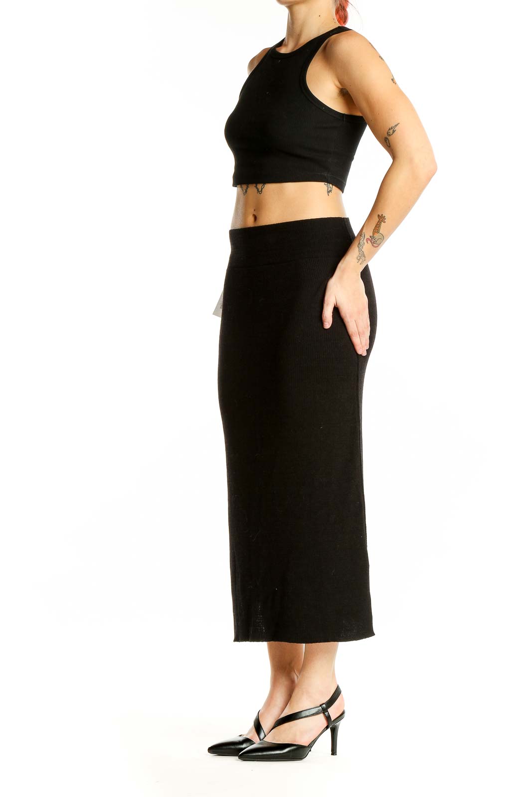 Front view of Free People Black Ribbed Cotton Midi Skirt on model